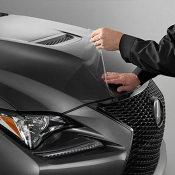supergroup dealerships image of a person breaking into a car window