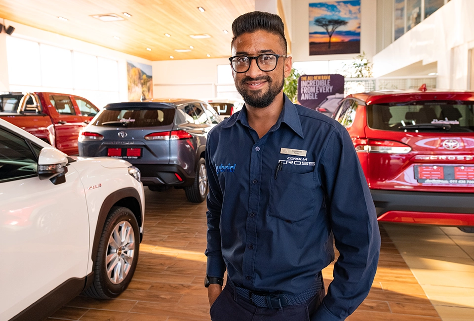 why choose Supergroup Dealerships as your perfered dealership group, lady looking into a vehicle.